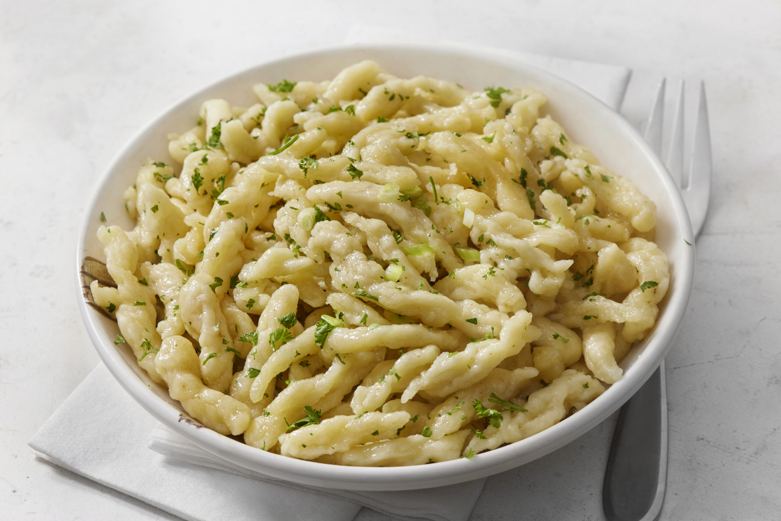 spaetzle in a white bowl