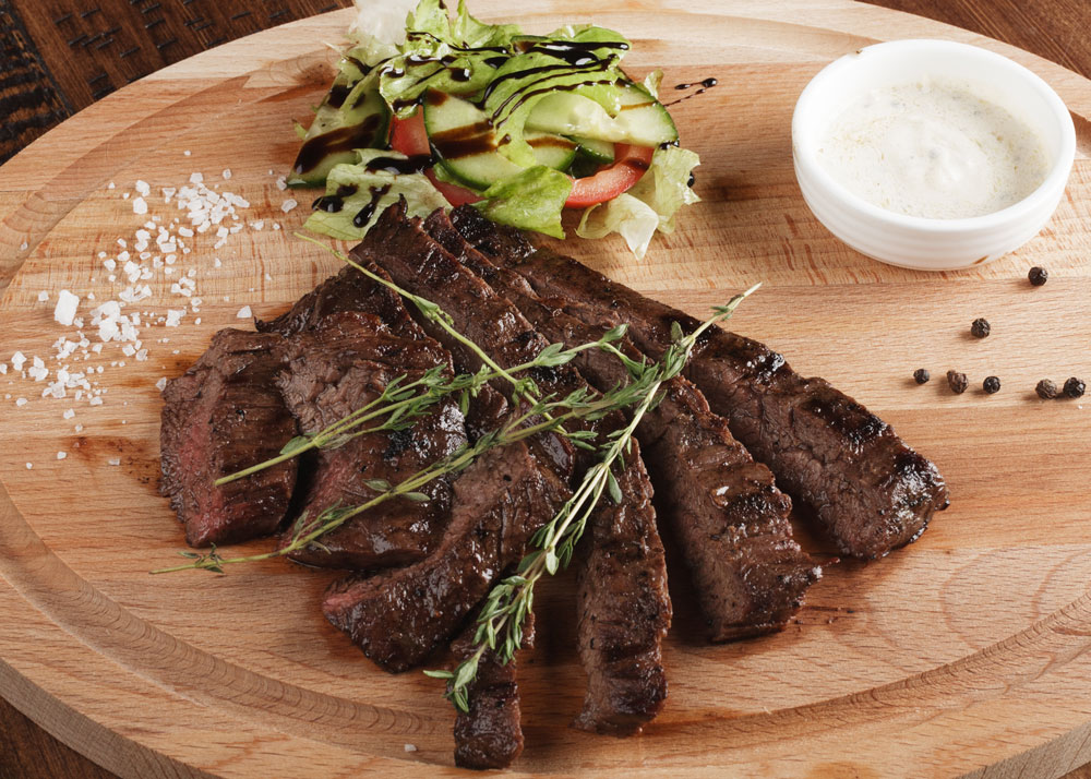 Creole-Rubbed Flank Steak with Herb Butter